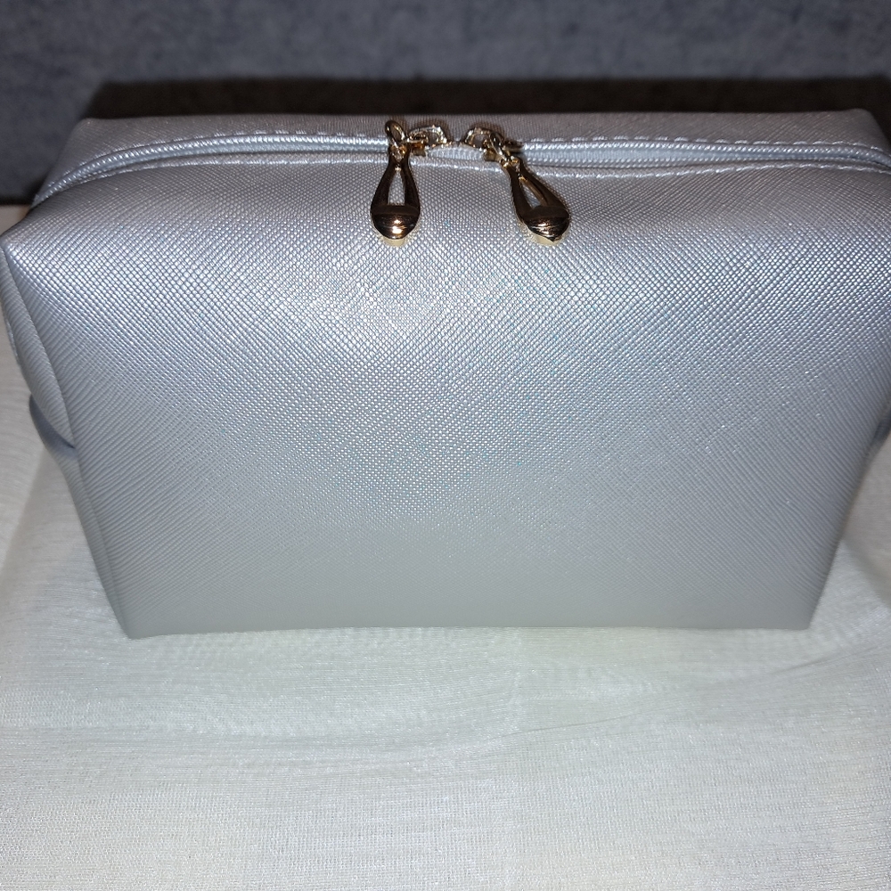 Elegant Silver Women's Bag And A Pink Make Up Bag